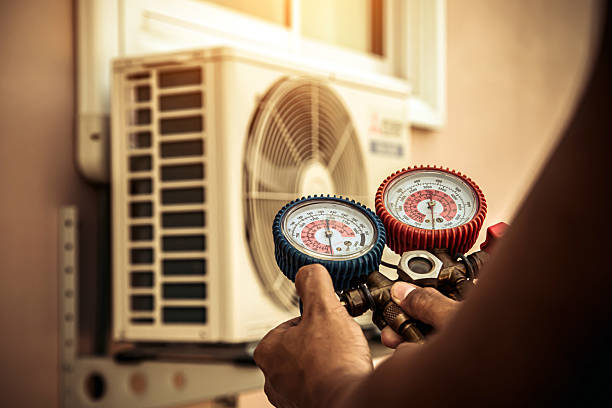 Professional Air Conditioning Service technician working in Mount Prospect, IL